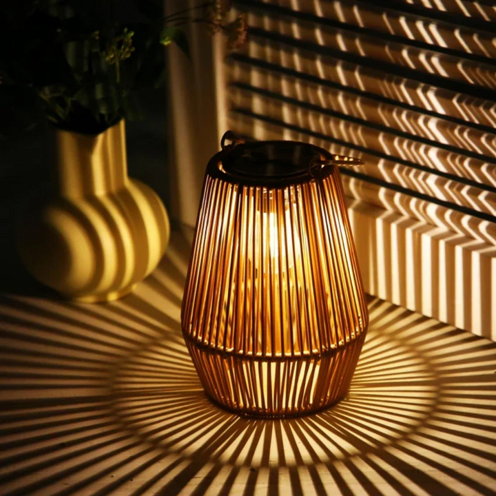 Handwoven solar outdoor lantern, waterproof & eco-friendly, perfect for garden & patio lighting.