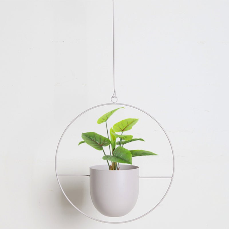 Stylish metal hanging pot, a modern home accent for any room. Perfect for small indoor plants & succulents.