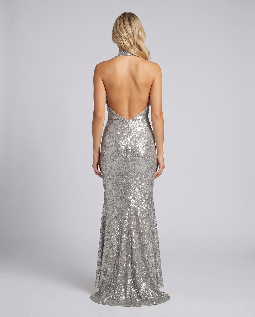 Dazzling sequin halter mermaid gown, a women's sophisticated maxi dress for elegant evenings.