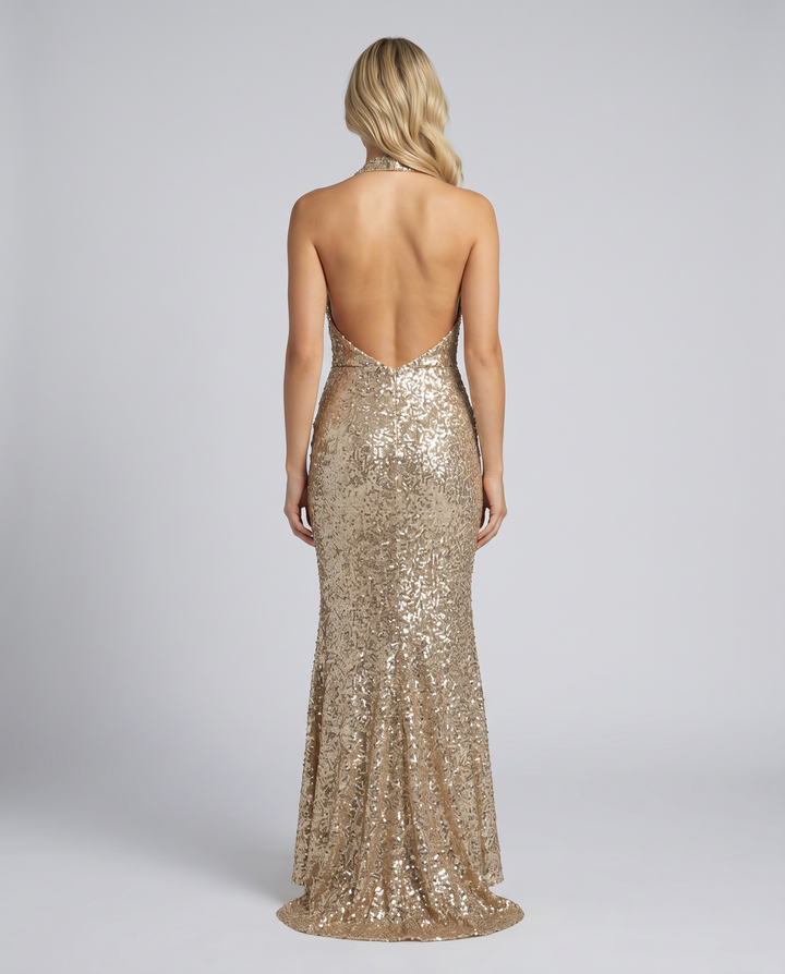 Shimmering sequin mermaid gown with a chic halter top, perfect for an elegant evening party.
