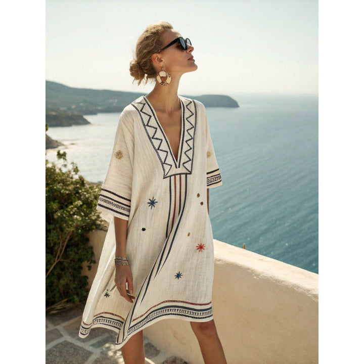 Bohemian embroidered kaftan dress for women, ideal resort wear & beach cover-up.