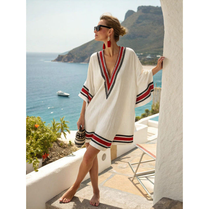 Flowy women's embroidered kaftan beach dress, a comfortable relaxed fit summer cover-up.