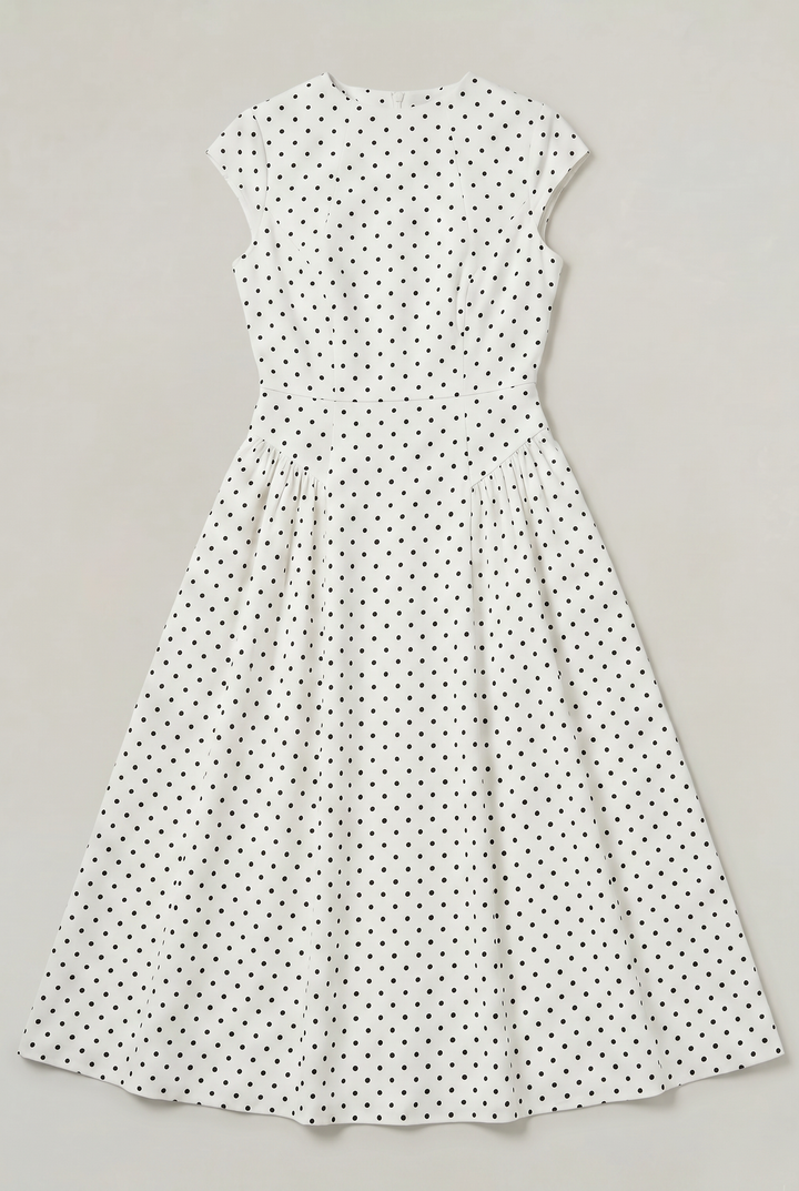 Women's classic polka dot maxi dress, A-line cut with cap sleeves & round neck. Ideal elegant summer wear.