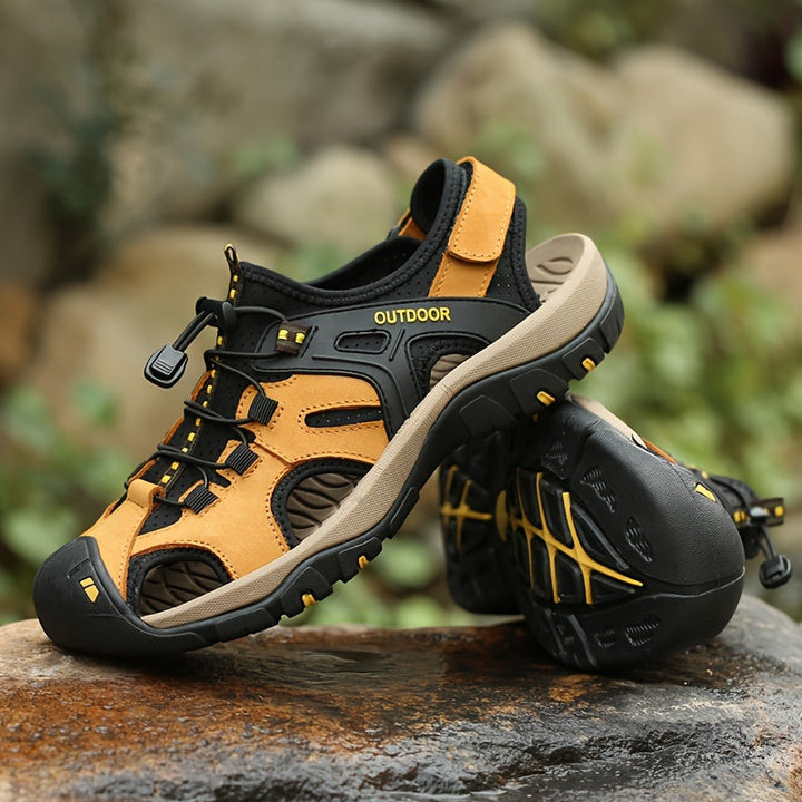 Comfortable men's closed-toe hiking sandals with arch support, ideal for outdoor trail walking.