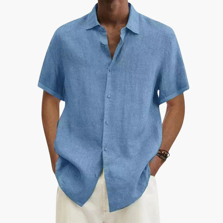 Casual men's short sleeve button-up shirt, perfect for warm summer days. Lightweight & comfortable for everyday.