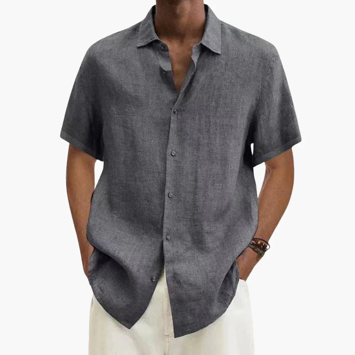 Stylish men's everyday short sleeve button-up shirt. Relaxed fit for a cool, casual summer look. Breathable.