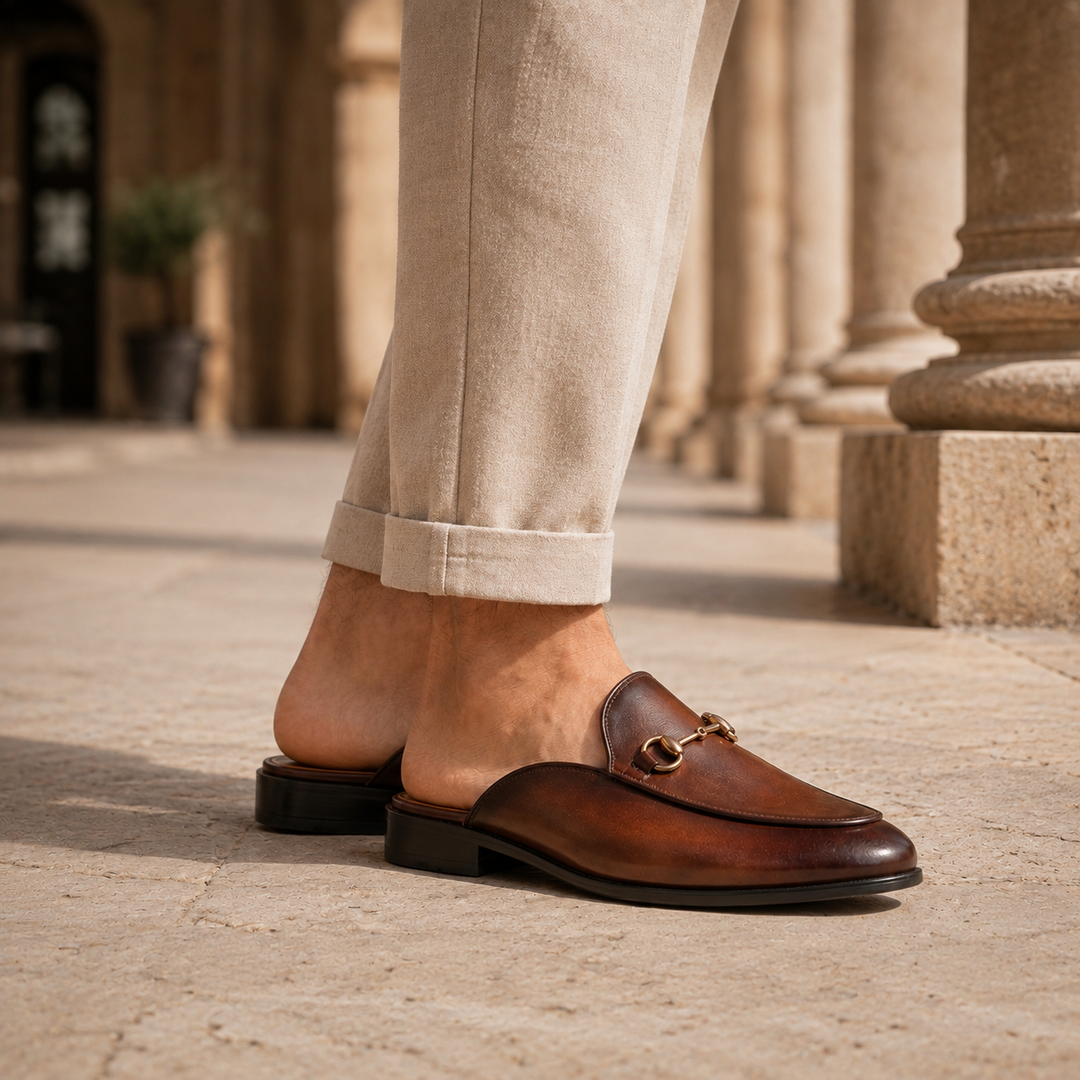 Smart-casual men's mules featuring a classic horsebit, designed for orthopedic support & everyday comfort.
