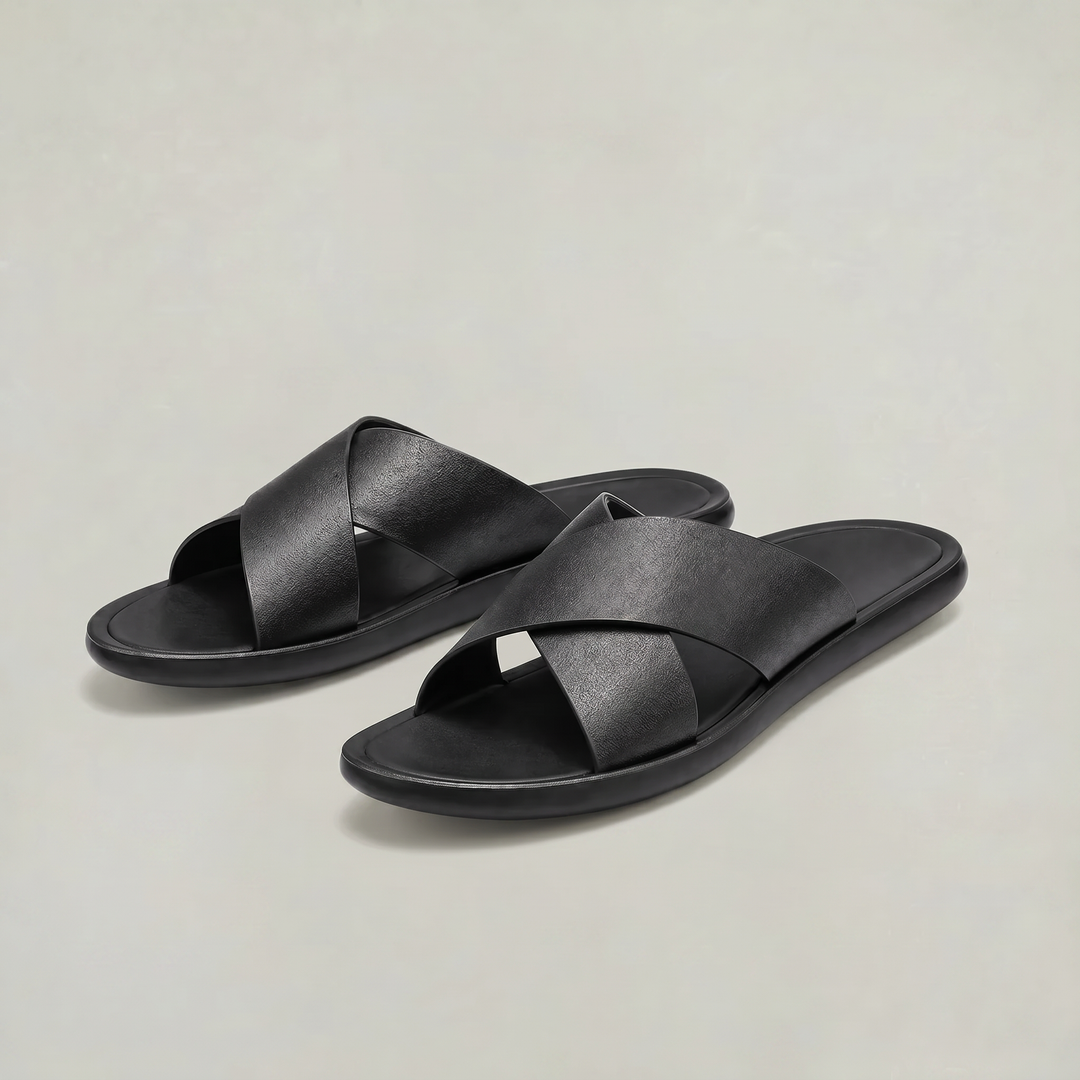 Brown men's cross strap slide sandals with a relaxed fit. Perfect for warm weather & comfort.
