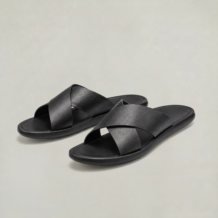 Brown men's cross strap slide sandals with a relaxed fit. Perfect for warm weather & comfort.