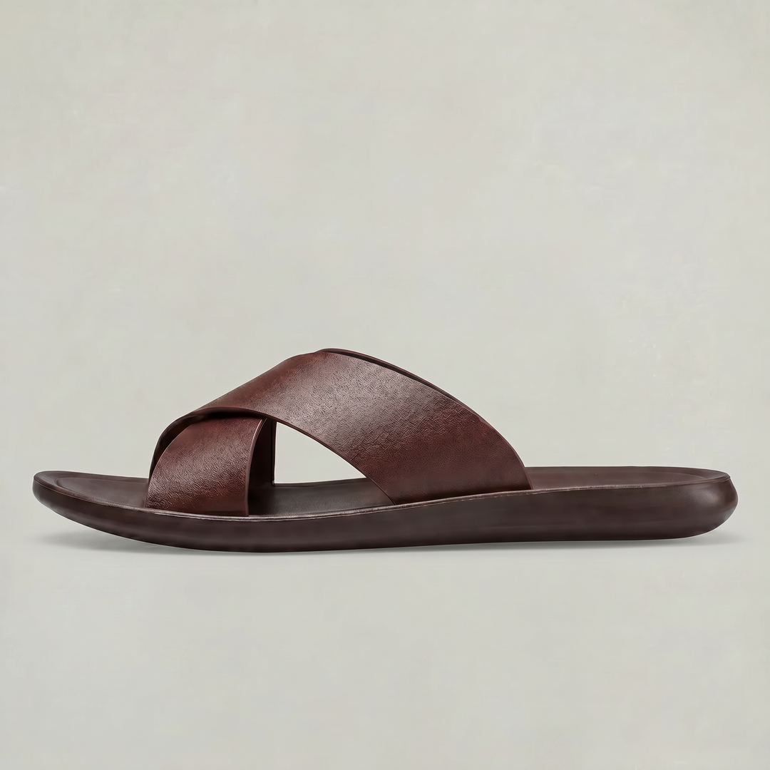 Relaxed fit men's cross strap slides, perfect for warm weather & easy slip-on casual comfort.