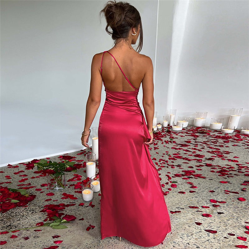 Sophisticated one-shoulder women's maxi dress. Sleek, long party dress, perfect club wear & special occasion attire.