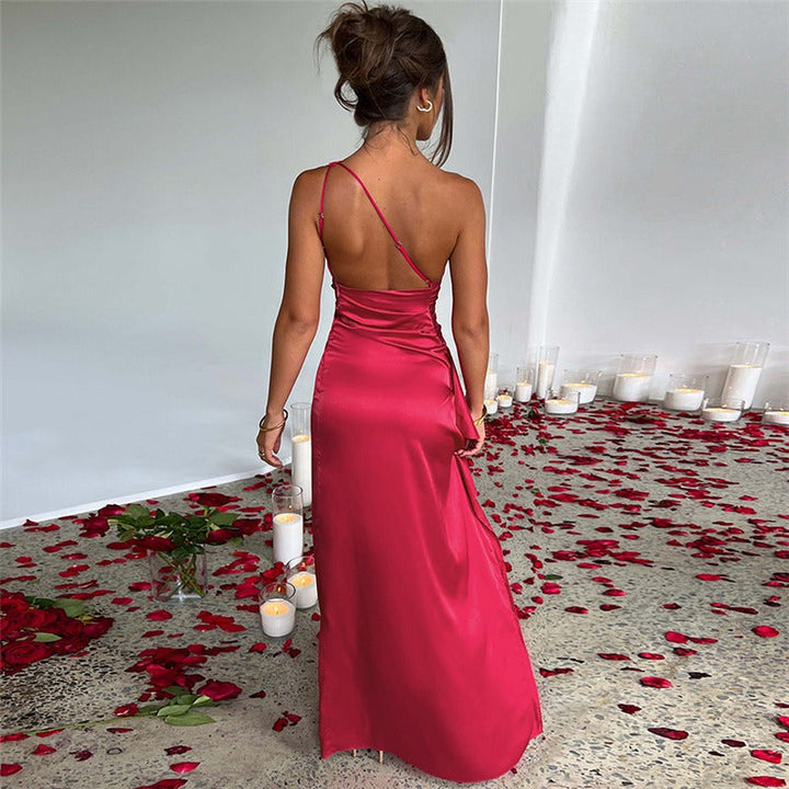 Sophisticated one-shoulder women's maxi dress. Sleek, long party dress, perfect club wear & special occasion attire.