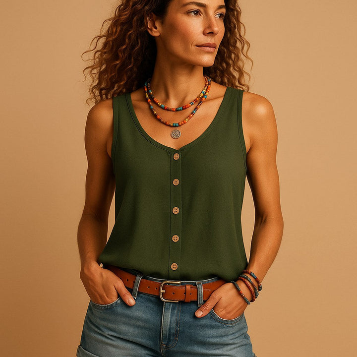 Woman in relaxed sleeveless V-neck top with button detail, perfect for casual summer wear.