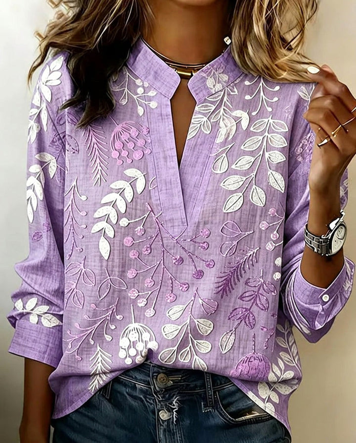 Women's floral V-neck blouse, lightweight & stylish, perfect for spring/summer casual or office wear.