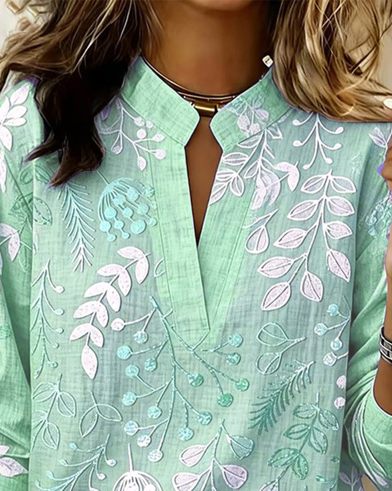Everyday elegant women's V-neck floral blouse, offering a relaxed yet fashionable spring/summer style.