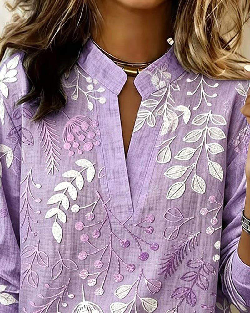 Lightweight pastel floral V-neck top for women. Comfortable everyday spring/summer casual wear.
