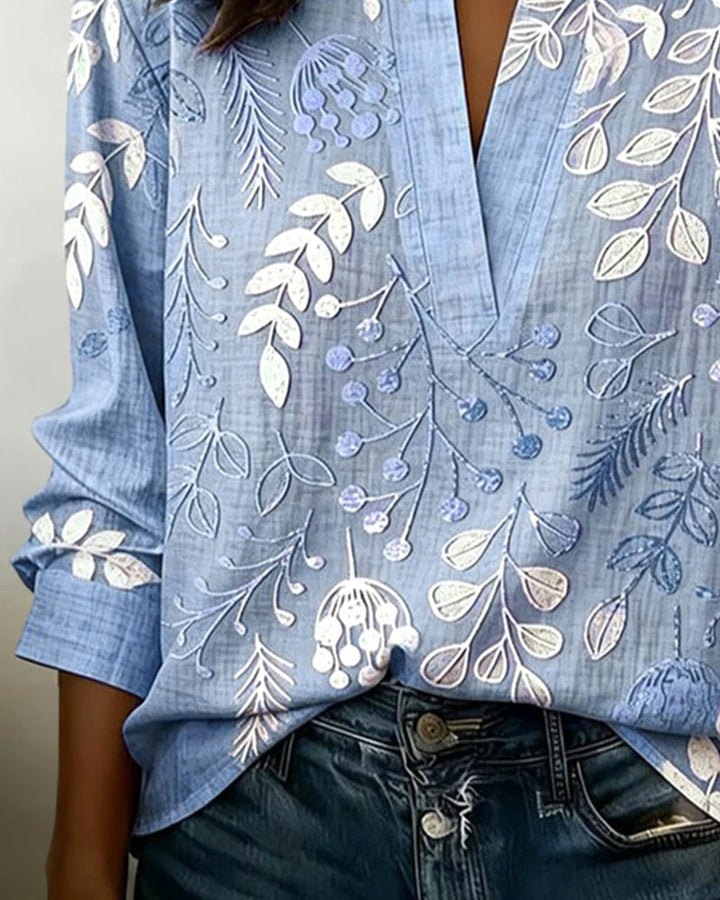 Effortlessly stylish floral V-neck top for women, perfect for a casual yet elegant summer look.