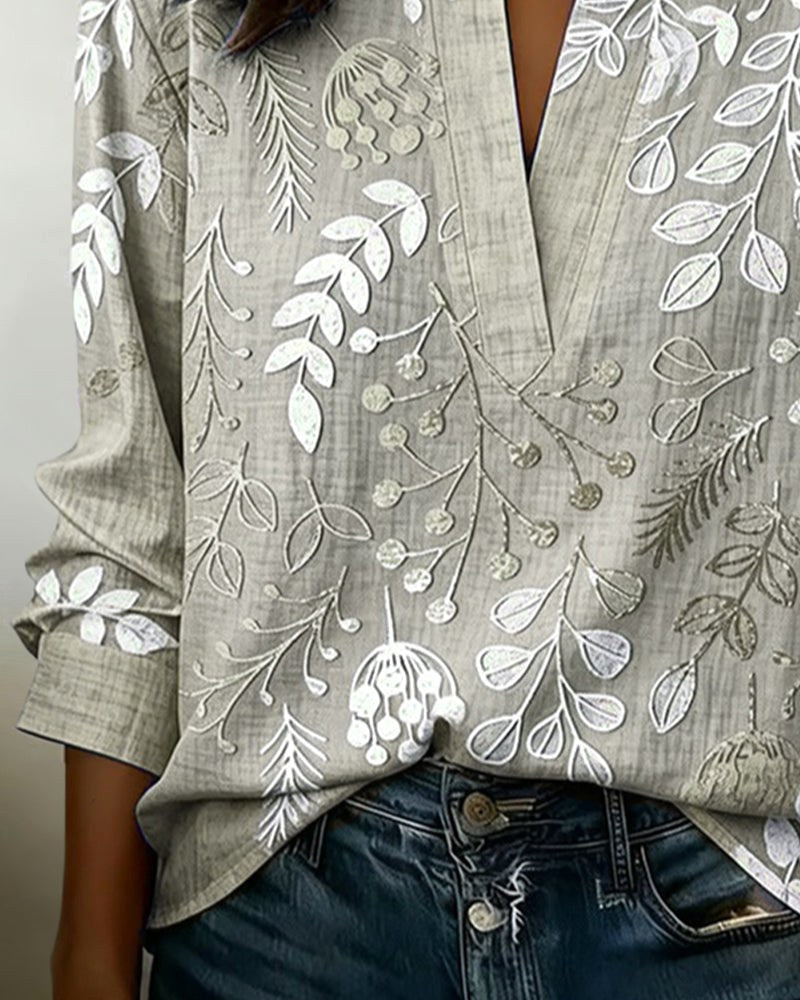 Beautiful women's floral V-neck blouse, flattering design & comfortable for all-day wear.
