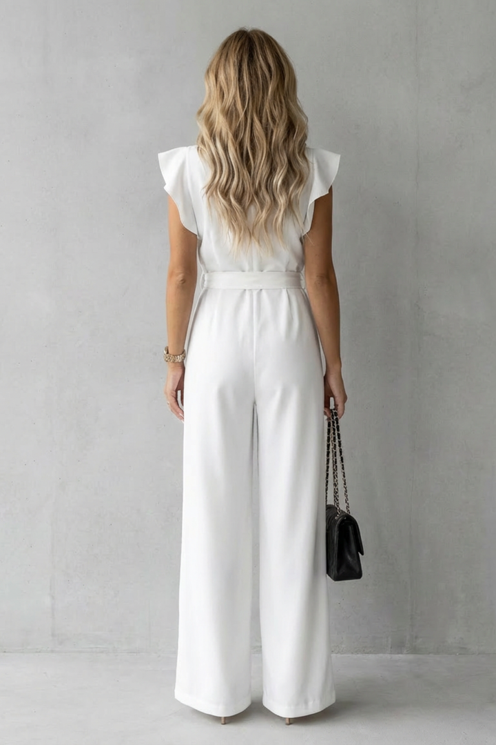 Chic belted wide-leg jumpsuit for women, featuring stylish ruffle sleeves. Versatile for office or events.