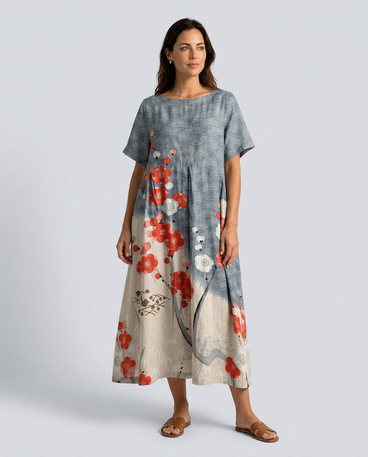 Elegant floral boho maxi dress for women, ideal for casual summer days or vacation; features pleated skirt.