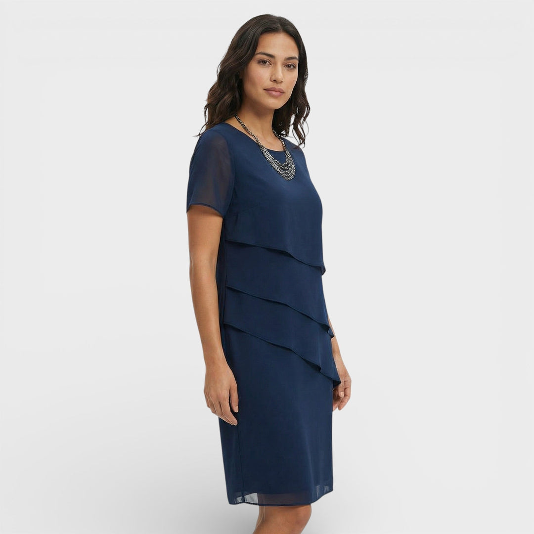 Women's tiered ruffle midi cocktail dress. Fashionable and flowy for special occasion and party wear.