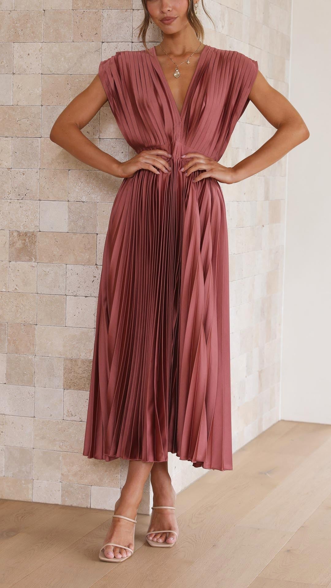 Elegant flowy pleated maxi dress for women, perfect summer occasionwear.