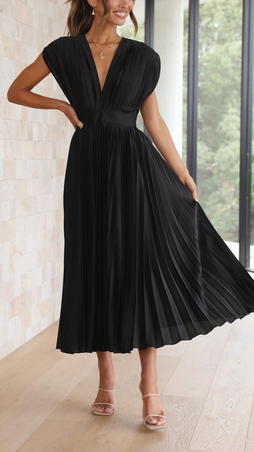 Graceful flowy pleated maxi dress for women, perfect for special summer moments.