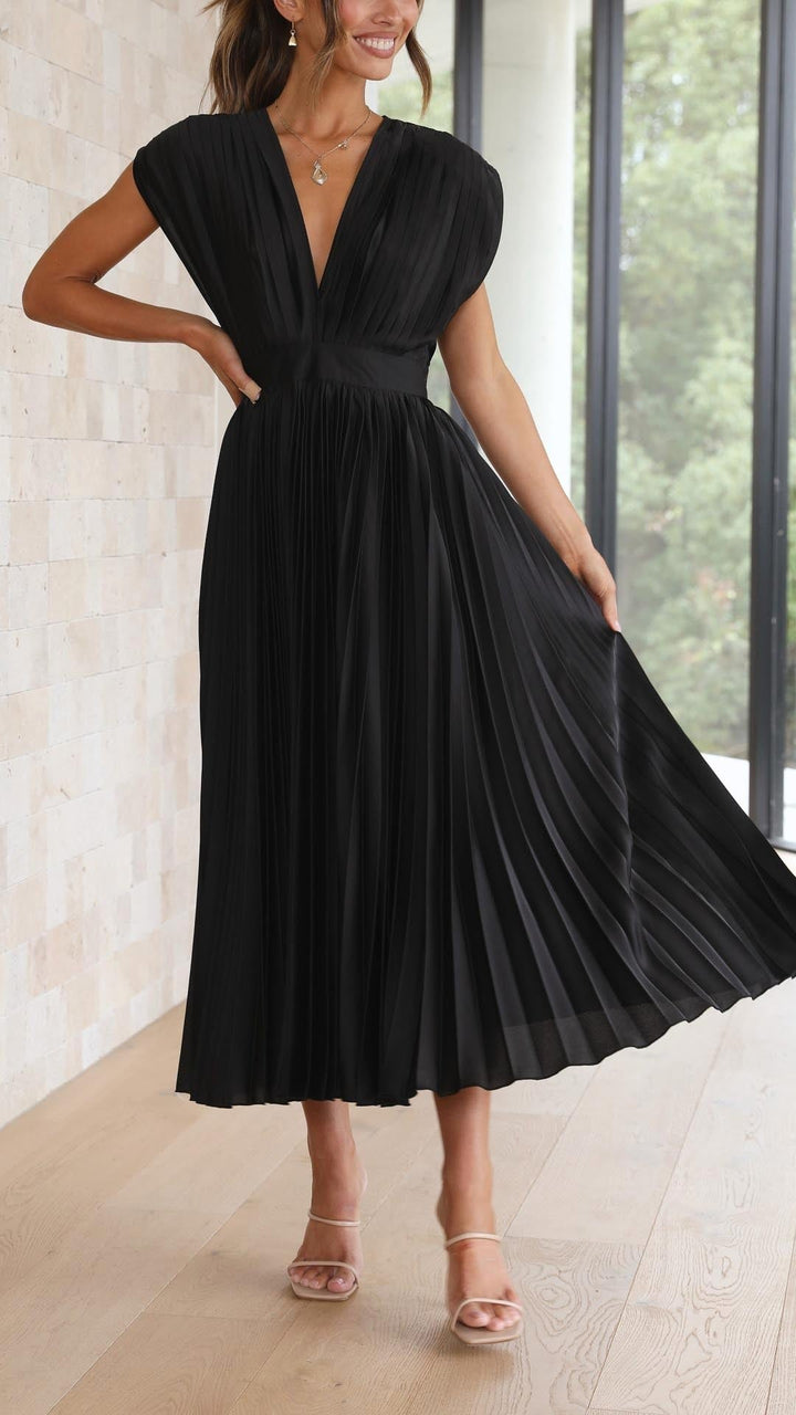 Graceful flowy pleated maxi dress for women, perfect for special summer moments.
