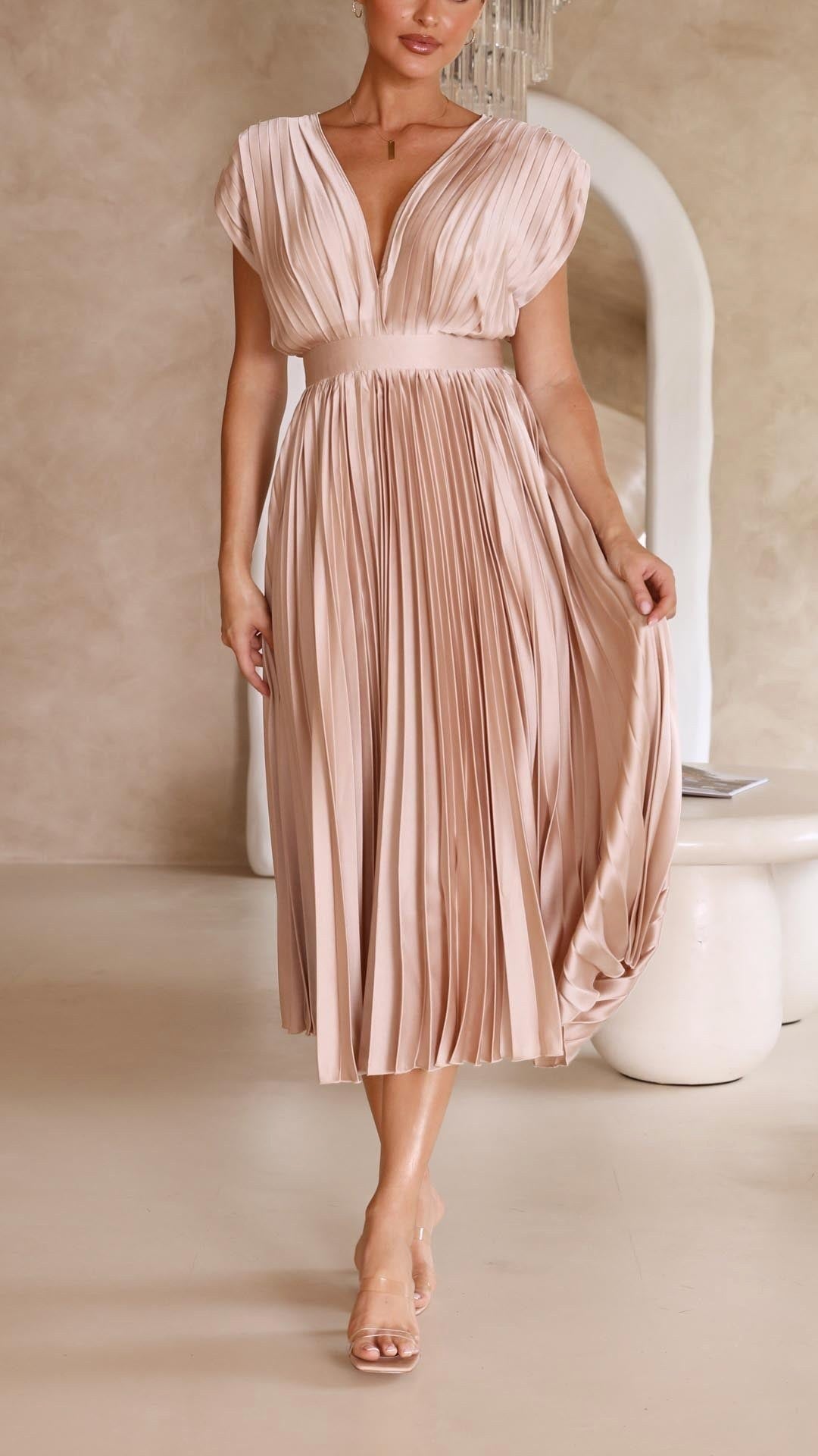 Sophisticated women's pleated maxi dress, perfect for elegant evening wear.