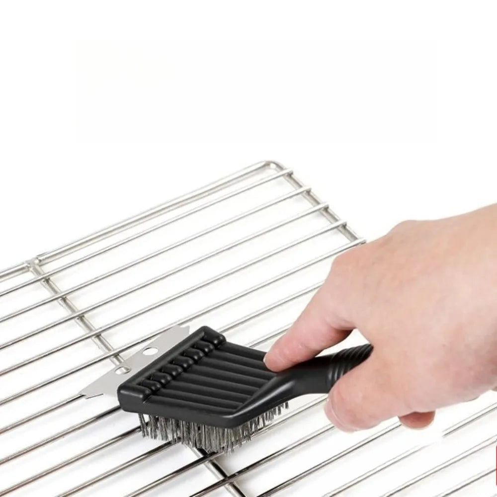 Durable heavy-duty grill cleaner, black handle, silver scraper, and sturdy bristles for long-lasting BBQ maintenance.