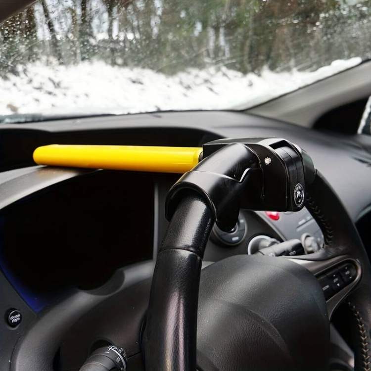 Yellow heavy-duty steering wheel lock providing universal car security & anti-theft protection for vehicles.
