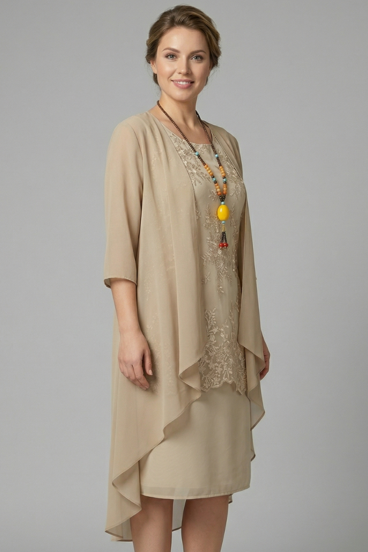 Relaxed fit women's lace midi dress in an elegant layered cocktail style, suitable for various special events.
