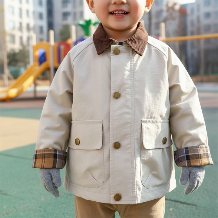 Adorable toddler & youth boys' spring/autumn jacket. Features cool plaid cuffs & button-front.