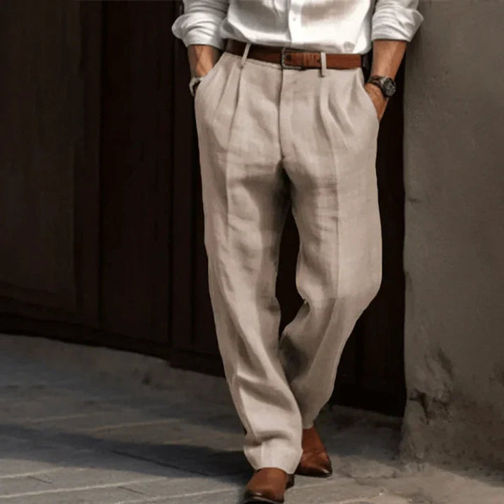 Classic men's pleated pants in grey, offering a comfortable straight leg fit for sophisticated men's fashion.
