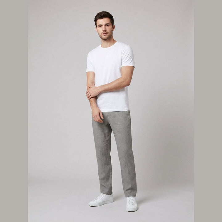 Stylish men's light blue relaxed fit pleated trousers, great for summer casual looks.