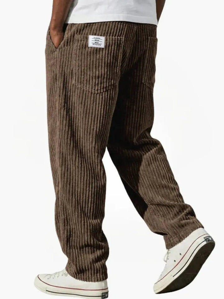 Soft ribbed corduroy men's trousers with a relaxed fit, perfect for comfortable daily wear and style.