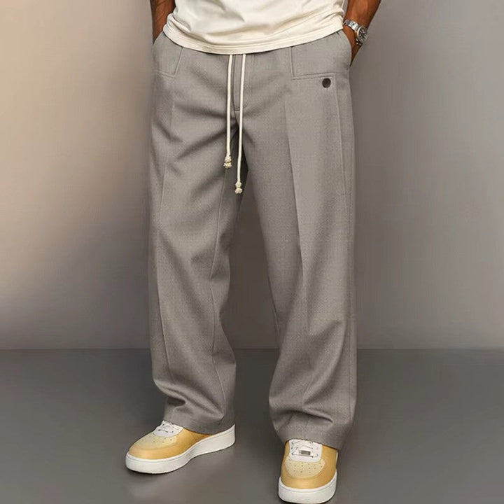 Men's khaki wide leg drawstring pants for a relaxed, comfortable fit; perfect for casual everyday wear.