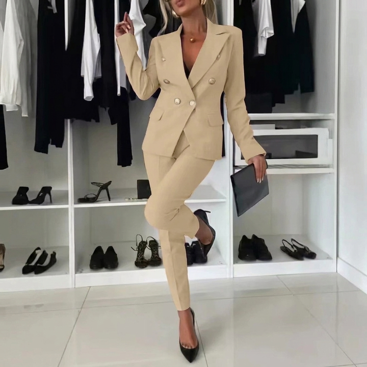 Elegant women's blazer & slim-fit pants suit set, perfect professional attire for workwear.