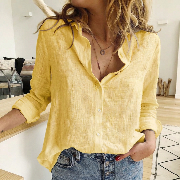Stylish women's lapel button-front long sleeve top in a solid color, an elegant everyday blouse.