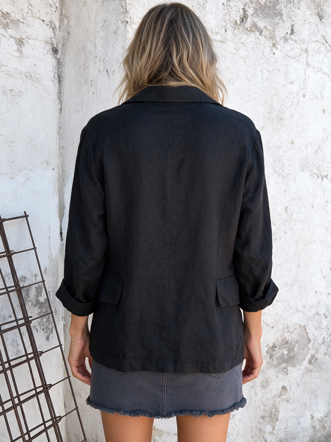 Minimalist style women's blazer, a classic and elegant layering piece for chic fashion.