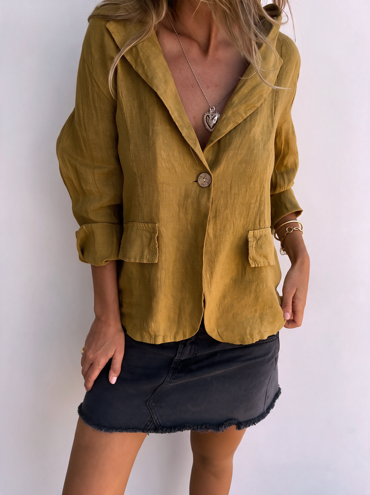 Chic women's lightweight blazer, an all-season minimalist jacket for elegant apparel.