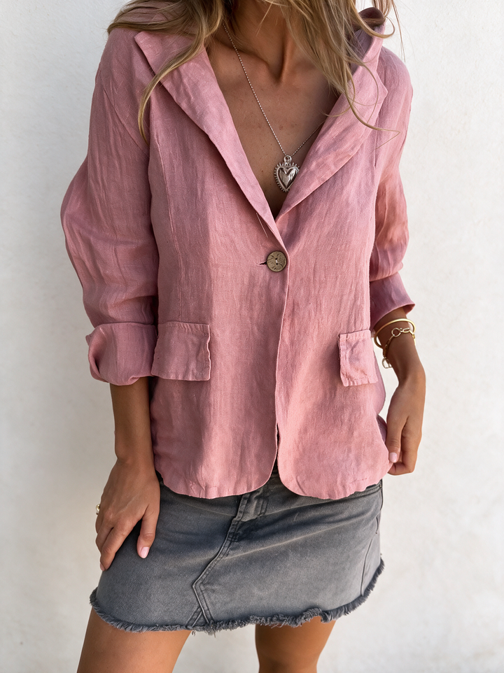 Sophisticated women's minimalist jacket, a lightweight and versatile layering blazer.