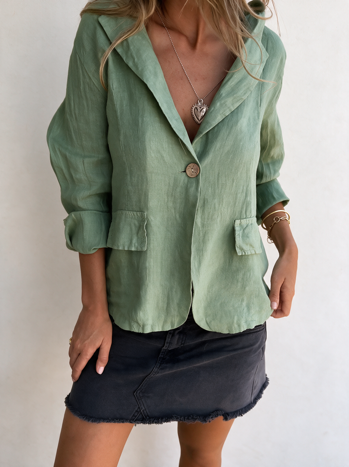 Chic women's blazer, a lightweight layering piece embodying minimalist style and elegance.