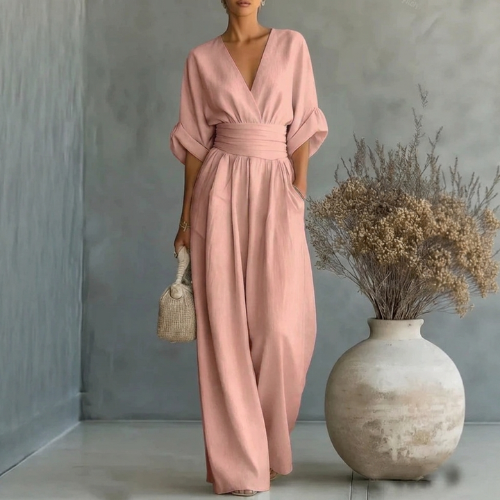 Fashionable women's short sleeve wide leg jumpsuit, perfect for a casual summer day or spring outing.