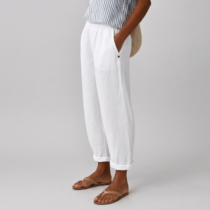 Versatile women's casual pants with unique 3D button accents, great for various seasons & styles.