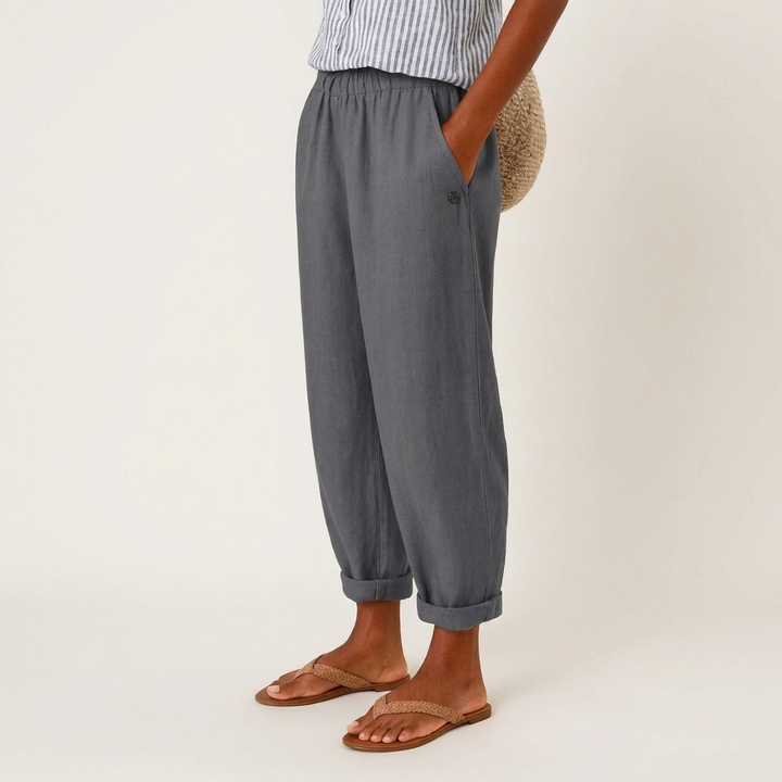 Fashionable women's casual pants with distinctive 3D buttons, offering a unique design for everyday elegance.