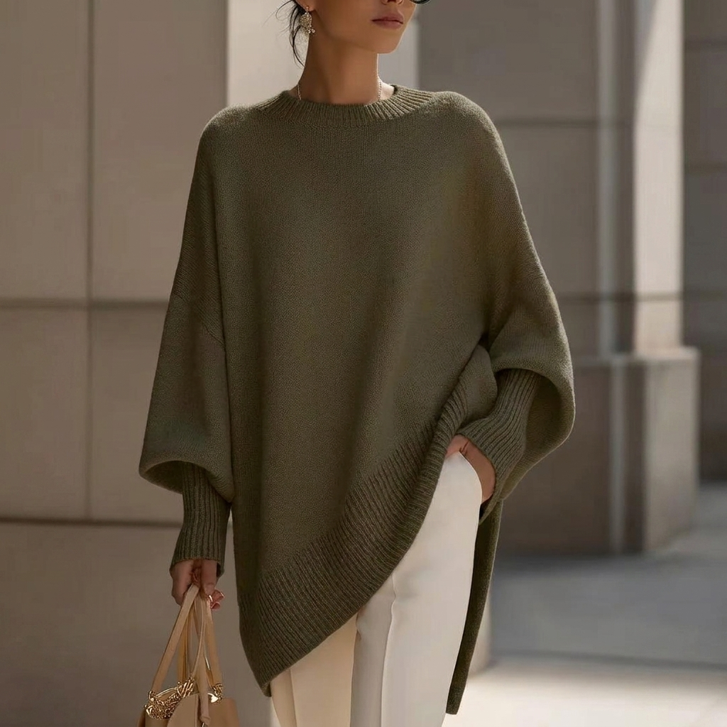Textured women's pullover sweater with a round neck & long sleeves. Perfect for winter style.