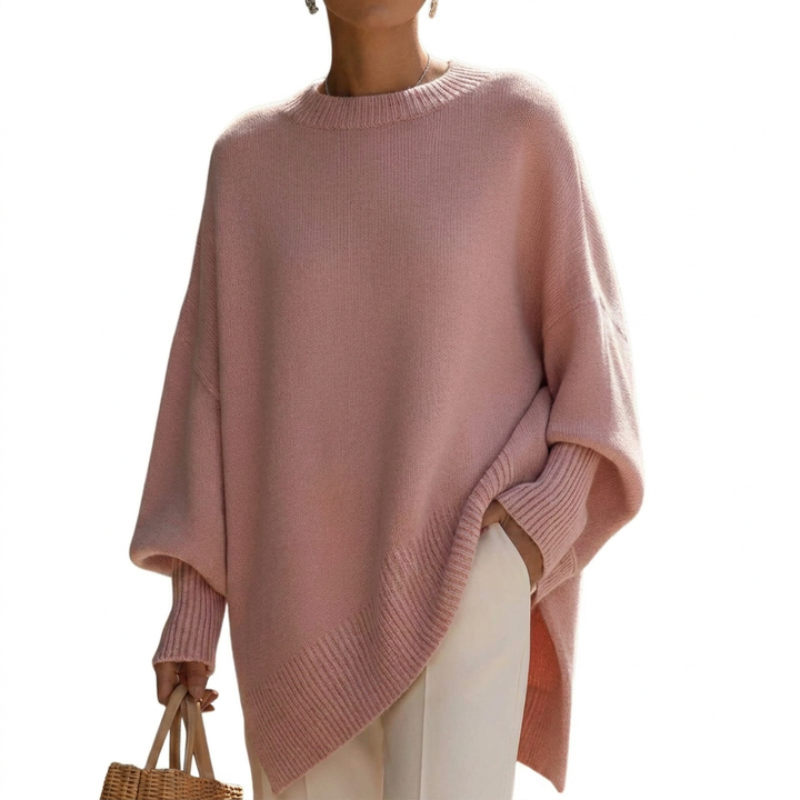Close-up of the textured knit on a women's long sleeve pullover sweater. Soft & cozy feel.