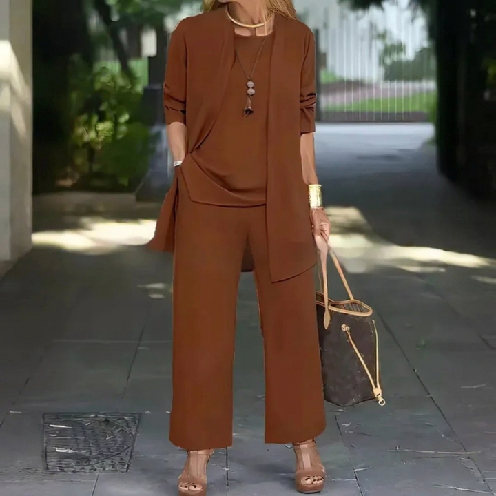 Modern women's 3-piece set: a flowing cardigan, a slim vest, and comfortable wide leg pants for any occasion.