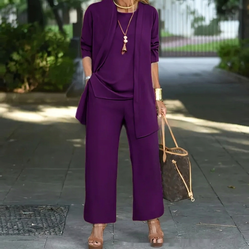 Women's versatile 3-piece set: long cardigan, vest, and wide leg trousers. Great for layered fashion looks.